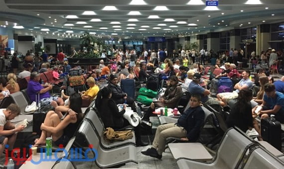 آلاف السياح البريطانيين يغادرون شرم الشيخ دون حقائبهم 1 بريطانيون عالقون بمطار شرم الشيخ
